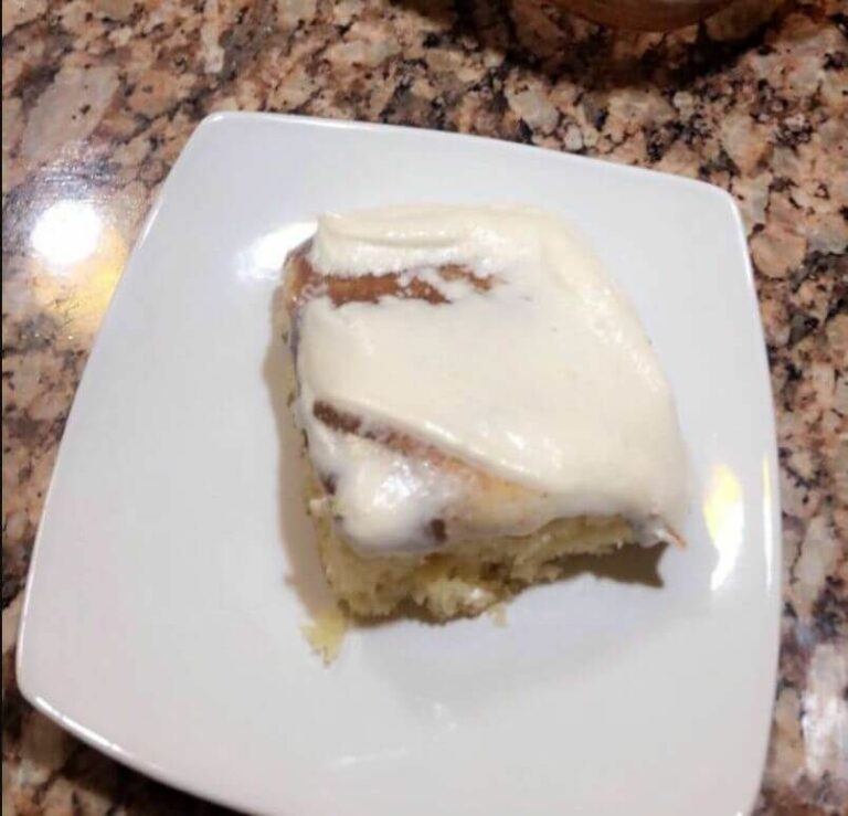 Sweet and Moist Cinnamon Roll Cake with Cream Cheese Frosting