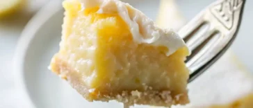 Slice of blender lemon pie on white plate with whipped cream / Lemon pie filling being poured from blender into graham cracker crust / Whole lemon pie with golden top cooling on wire rack