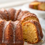 Slice of layered vanilla wafer cake showing cookie and pudding layers / Vanilla wafer cake in glass dish topped with whipped cream and berries / Close up of vanilla wafer cake texture showing soft cookie layers