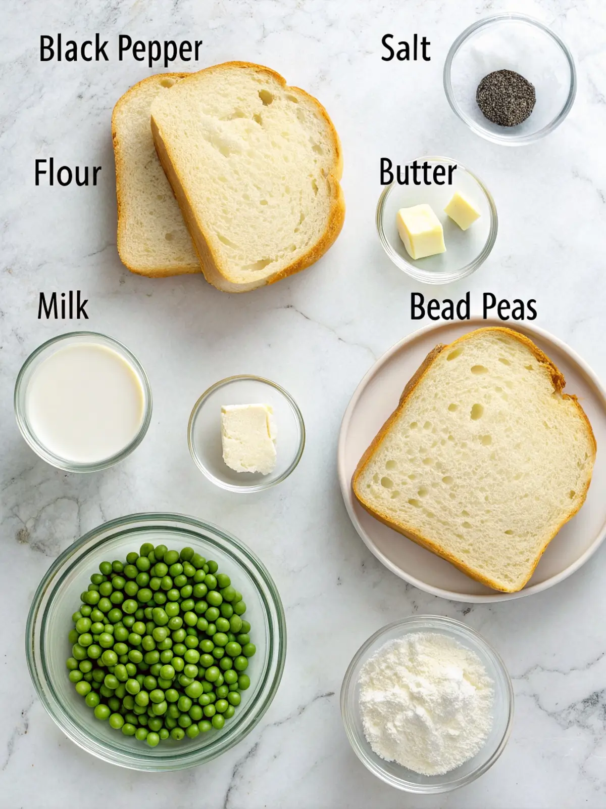 Two thick slices of sourdough toast on a white plate, topped generously with creamed peas in a silky white sauce, finished with cracked black pepper and fresh chopped chives.