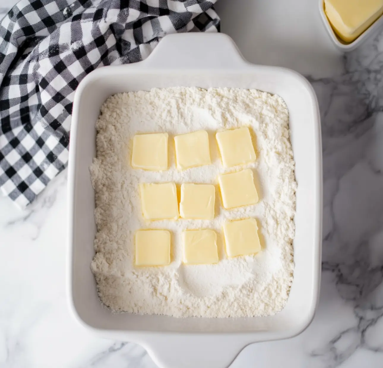 1 box of vanilla dry cake mix 2 cans of cherry pie filling 1 Stick of butter